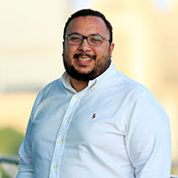 Abdelrahman Nagy smiling outdoors